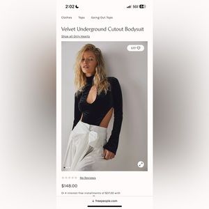 Black velvet bodysuit with cut outs, size small but fits like a medium!